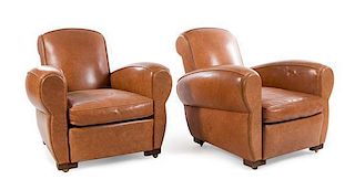 A Pair of Leather Upholstered Club Chairs Height 35 3/4 inches.