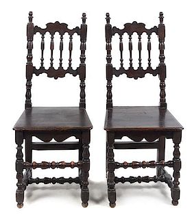 A Pair of Jacobean Style Carved Oak Side Chairs