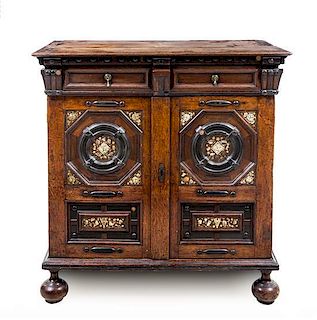 A Charles II Oak and Marquetry Cabinet Height 41 3/4 x width 39 3/4 x depth 24 inches.