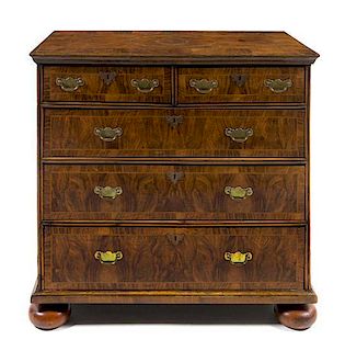 A Queen Anne Burlwood Chest of Drawers