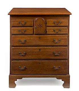 * A Provincial George III Oak Chest of Drawers