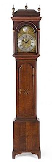 * An English Oak Tall Case Clock Height 94 1/2 inches.