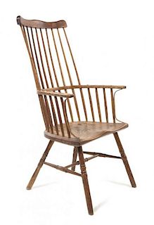 An English Windsor Armchair Height 43 1/2 x width 76 3/4 inches.