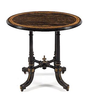 A Victorian Calamander and Ebony Occasional Table LATE 19TH CENTURY having an oval top with a mo...
