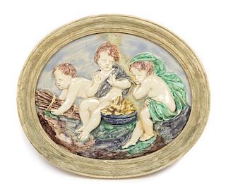 A Pair of Continental Ceramic Allegorical Plaques Width of larger 23 5/8 inches.