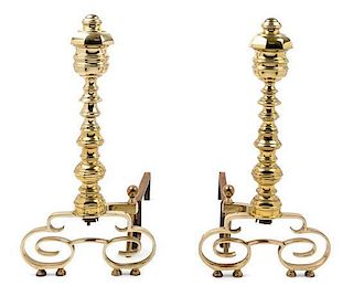A Pair of Brass Andirons and an Associated Fender Height of andirons 22 1/4 inches.