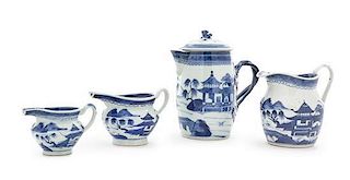 A Group of Three Canton Blue and White Creamers Height of tallest 8 3/4 inches.