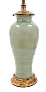 * A Celadon Glazed Porcelain Vase Height overall 18 5/8 inches.