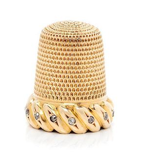 * An American 18-Karat Gold and Diamond Thimble, Simons Brothers Co., Philadephia, PA, the knurled top and body above a gadro