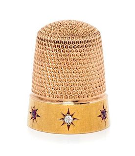 * An American 14-Karat Yellow Gold, Diamond and Ruby Thimble, Simons Brothers Co., Philadelphia, PA, the knurled top and body
