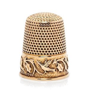 * An American 14-Karat Yellow Gold Thimble, Ketcham & McDougall, New York, NY, 19th Century, the knurled top and body above a