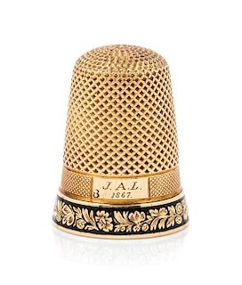 * An American Yellow Gold and Enamel Thimble, , the knurled top and body above an engine turned band with an engraved cartouc