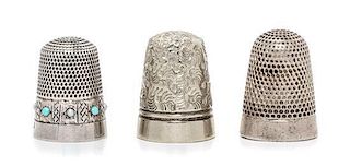 * A Group of Three English Silver Thimbles, Various Makers, comprising a Victorian example having a knurled top and body, Hen