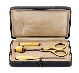 * A German Silver and Guilloche Enamel Four-Piece Sewing Kit, , comprising scissors, a thimble, a stiletto and a needle case,