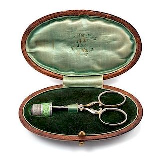 * An American Silver and Guilloche Enamel Thimble and Scissor Set, Simons Bros., Philadelphia, PA, the thimble with a green g