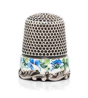 * An American Silver and Enamel Thimble, Ketcham & McDougall, New York, NY, the knurled top and body above a white enamel ban