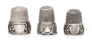 * A Pair of American Silver Grapevine Thimbles, Simons Bros., Philadelphia, PA, each having a knurled top and body above a gr