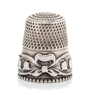 * An American Silver Lily of the Valley Thimble, Stern Bros., Philadelphia, PA, the knurled top and body above a band worked 