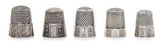 * Five Silver Thimbles, Simons Bros., Philadelphia, PA and others, each having a knurled top and body above a paneled base.