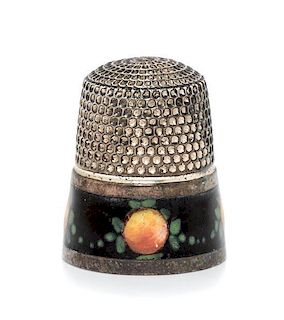 * An American Silver and Enamel Thimble, , having a knurled top and body above a black enamel band decorated to show fruit an