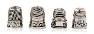 * A Group of Four American Silver Thimbles, Various Makers, comprising an example having a knurled top and body above a folia