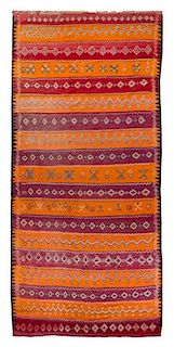 * An Afghan Wool Rug 11 feet 4 inches x 5 feet 9 3/4 inches.