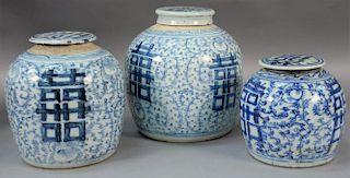 Three Chinese blue and white double happiness porcelain ginger jars with covers, three sizes.  ht. 7in., ht. 9in., and ht. 10