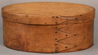 Shaker oval pantry box, four finger with copper points and tacks, inscribed on top and side Brown Sugar.  ht. 3 3/4in., lg. 9