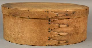 Shaker oval pantry box, five finger with copper points and tacks.  ht. 4 1/4in., lg. 11 1/4in. Provenance:  Estate of Arthur 