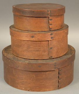 Nest of three round graduated bentwood pantry boxes.  ht. 2 1/4in. to 3 1/4in., dia. 5 3/4in. to 8 1/2in. Provenance:  Estate