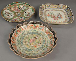 Three piece Famille Rose lot including square dish, shaped dish, and scalloped dish (scalloped dish with two chips). 
square: