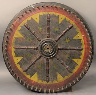 Polychrome painted wood game wheel.  dia. 26 1/2in. Provenance:  Estate of Arthur C. Pinto, MD