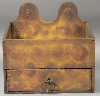 19th Century wall box with brown and yellow grain paint and one drawer.  ht. 12in., wd. 12in.  Provenance:  Estate of Arthur 