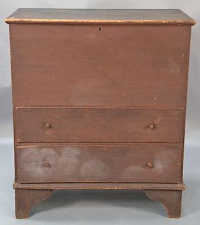 Primitive blanket chest with lift top over two drawers set on cut out bracket base in old brown paint.  ht. 46in., wd. 38in. 
