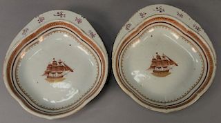 Pair of Chinese export sweet meat dishes with lipped handle, hand painted ship in center and gilt border. 
lg. 10in.