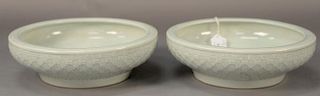 Pair of celadon glazed center bowls having basket weave pattern on sides of footed base, bearing seal mark on bottom.  ht. 3i