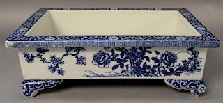 Chinese blue and white porcelain footed rectangular planter.  ht. 5in., lg. 15in., wd. 10 1/4in. Provenance:  Estate of Arthu