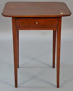 Federal mahogany stand with shaped top and one drawer, set on square tapered legs.  ht. 28in., top: 18" x 22 1/2" Provenance: