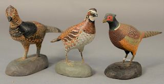 Three Albert J. Ditman (1884-1974) hand carved and painted miniature bird decoys on chip carved bases to include "Quail" sign