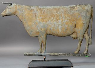 Cow weathervane, full body molded zinc with remnants of original finish. <R>ht. 16in., lg. 24 1/2in.