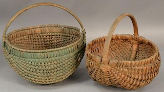 Two Melon baskets with handles, one in green paint.  ht. 12in., and ht. 13 1/2in. Provenance:  Estate of Arthur C. Pinto, MD