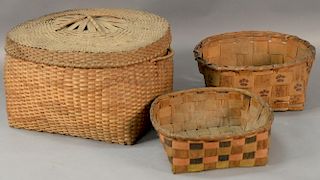 Three baskets to include one covered with handles and two with paint decoration (slight damage).  largest: ht. 12in., 18 1/2"