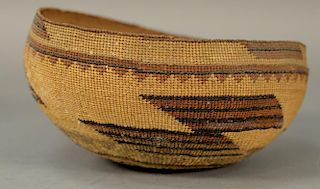 Finely woven Indian basket, decorated. 
ht. 3 3/4in., dia. 7 3/4in.