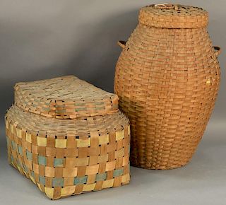 Two large splint Indian baskets, each with covers, one with paint decoration.  ht. 15in., 16" x 22"  ht. 27in. Provenance:  .