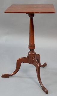 Cherry candlestand with square top on urn carved shaft with chip carving set on tripod base.  ht. 27 1/in., top: 15 1/4" x 15