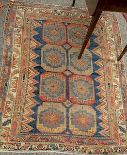 Oriental throw rug (one end border missing). 
3' x 5'