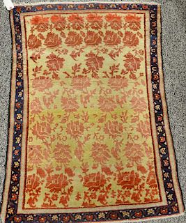 Two Oriental throw rugs. <R>(2' x 3'10") and (2'5" x 3'10")