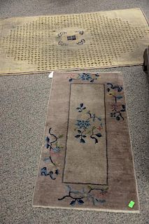 Three Chinese Oriental scatter rugs (one worn). 
(3'2" x 5'6"), (2' x 3'10"), and (2' x 3'10")
