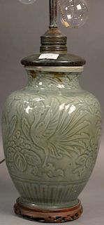 Large celadon glazed porcelain vase with incised peacock and leaf decoration, made into a table lamp.  vase ht. 12in.
