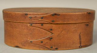 Shaker oval pantry box, three finger with copper points and tacks.  ht. 2 3/4in., lg. 7 1/2in. Provenance:  Estate of Arthur 